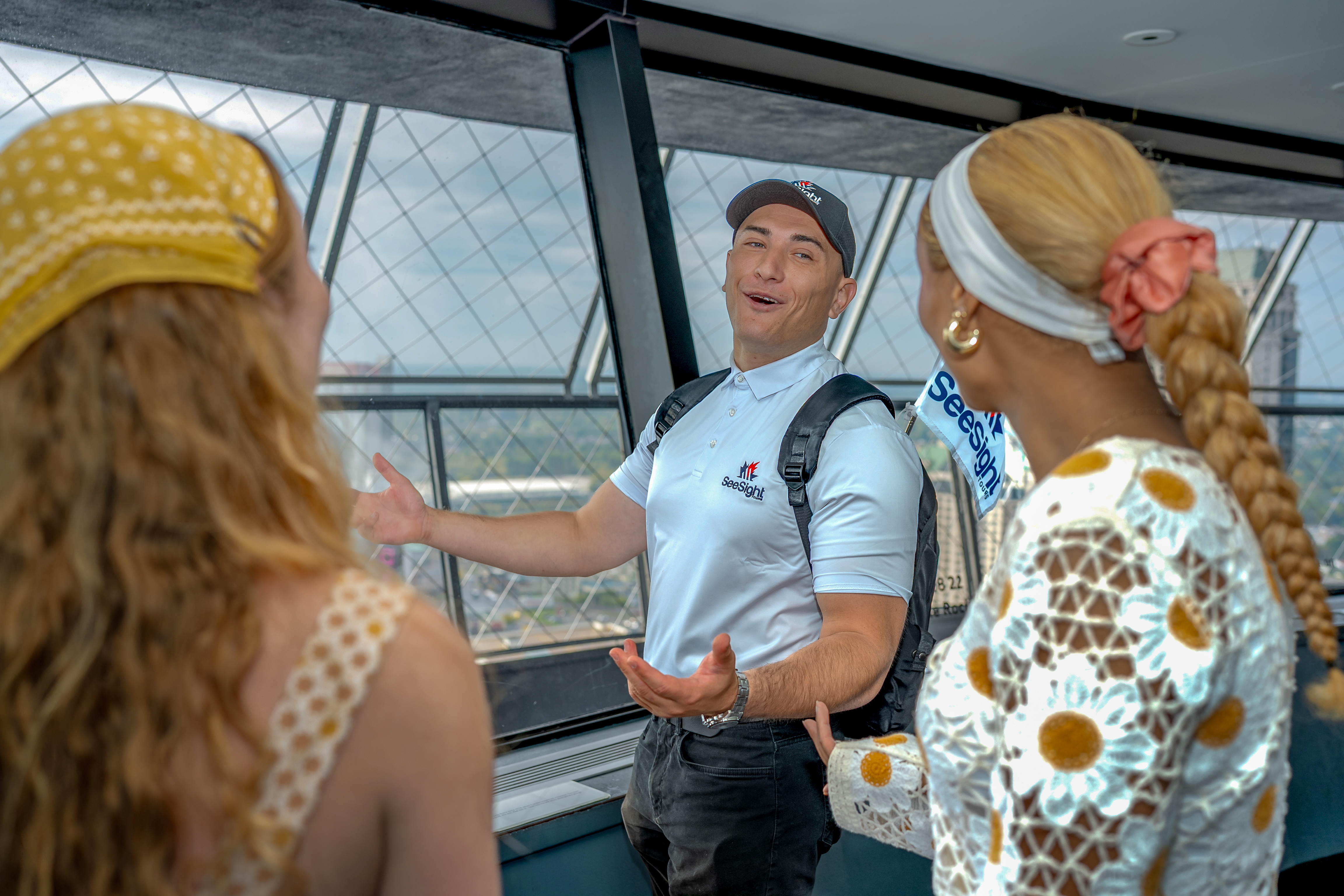 Guide interacting with guests